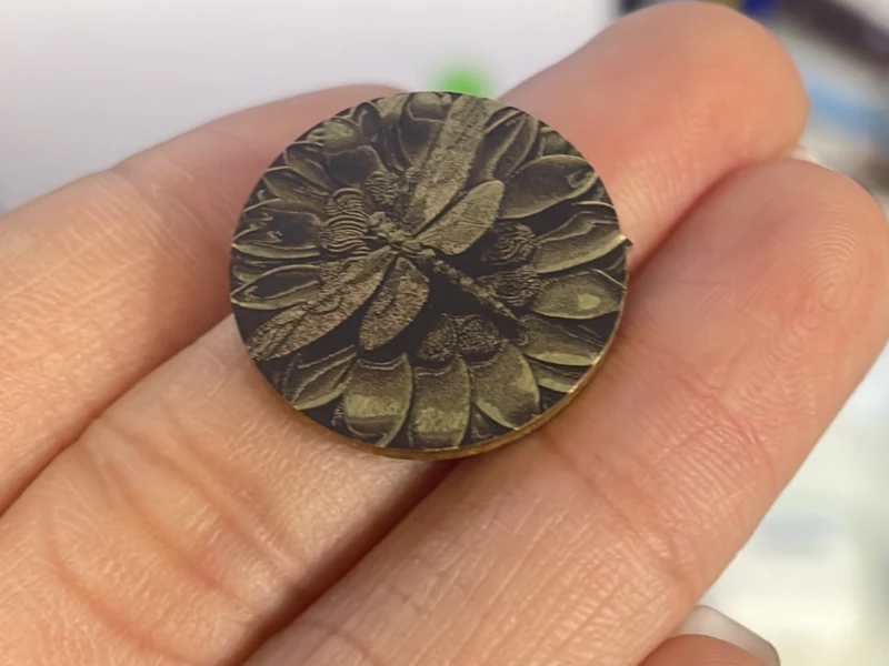 Coin engraved